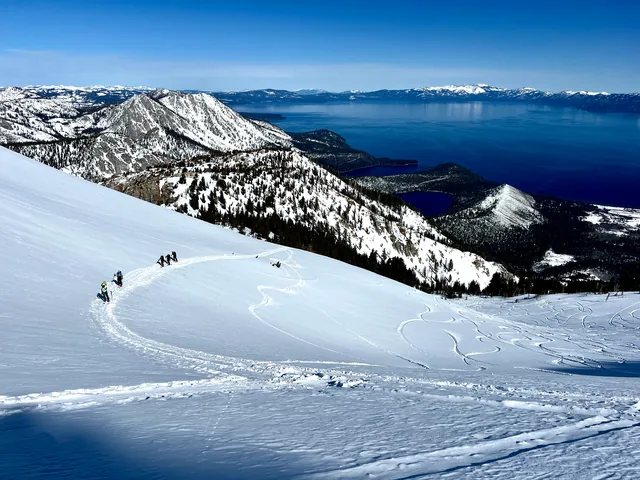Snow-covered Tahoe mountains above the lake